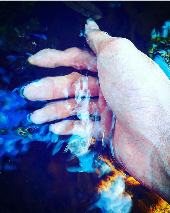 Hand on water