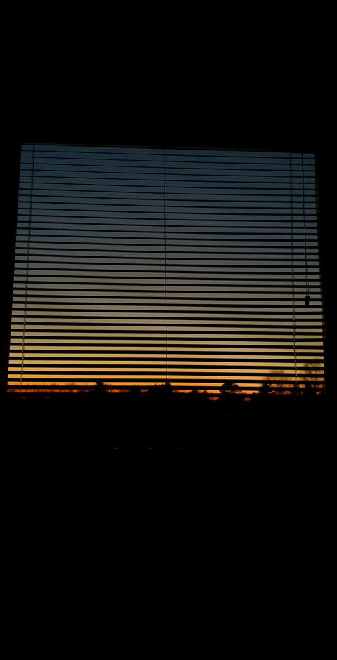 sunset by window