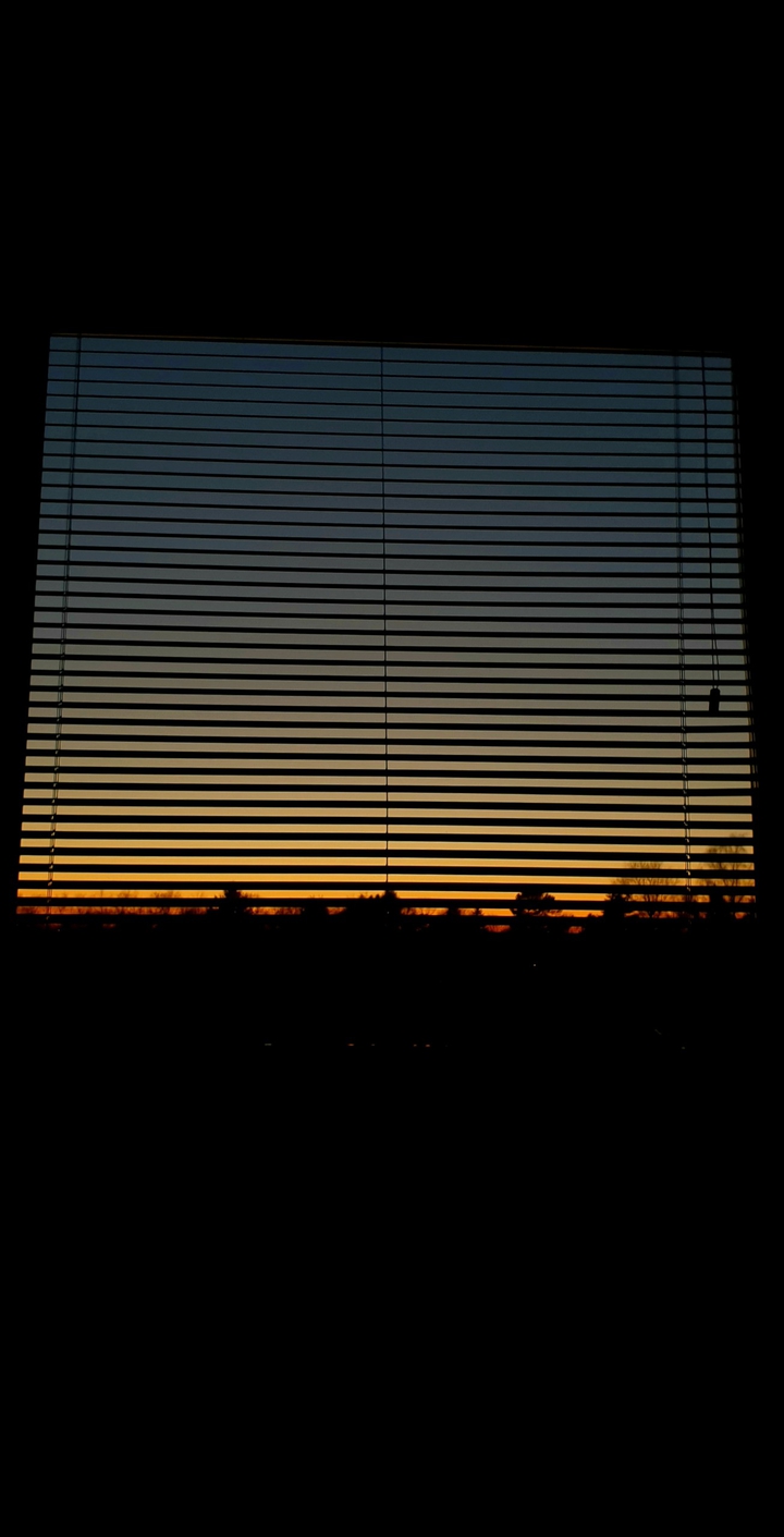 sunset by window