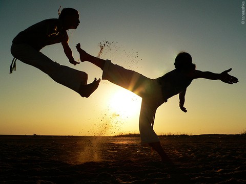 Capoeira mixes martial art, sport and music. Afro-brazilian